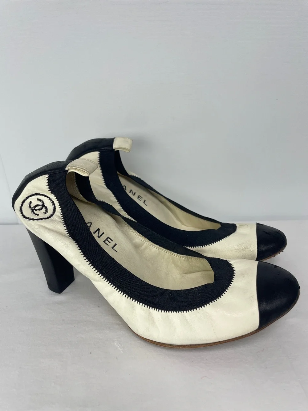 CHANEL Black & White Cap-Toe Leather Pumps